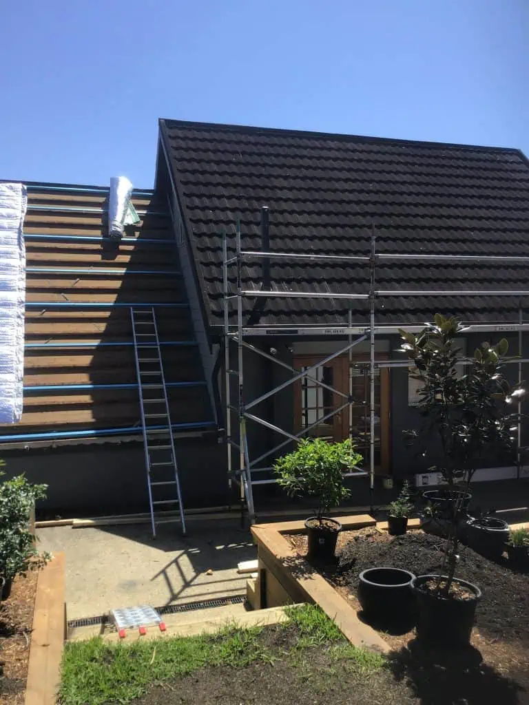 Scaffolding on a residential building for a roof replacement in Capalaba